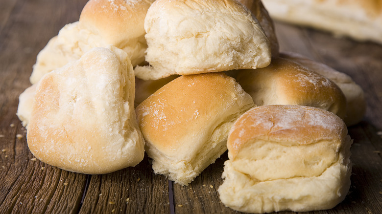 Dinner rolls on wooden counter