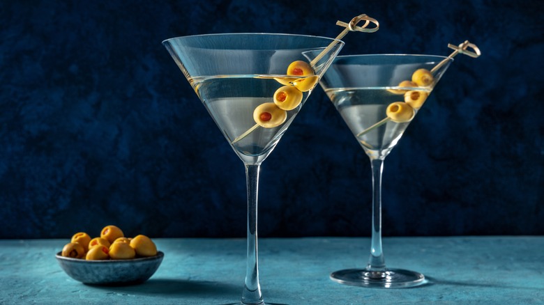 two martinis with olives