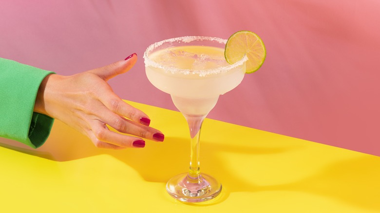 hand reaching for margarita