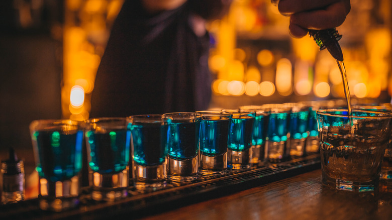 blue shooters on bar