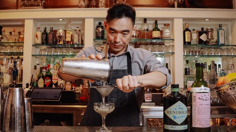 Bartender making cocktail