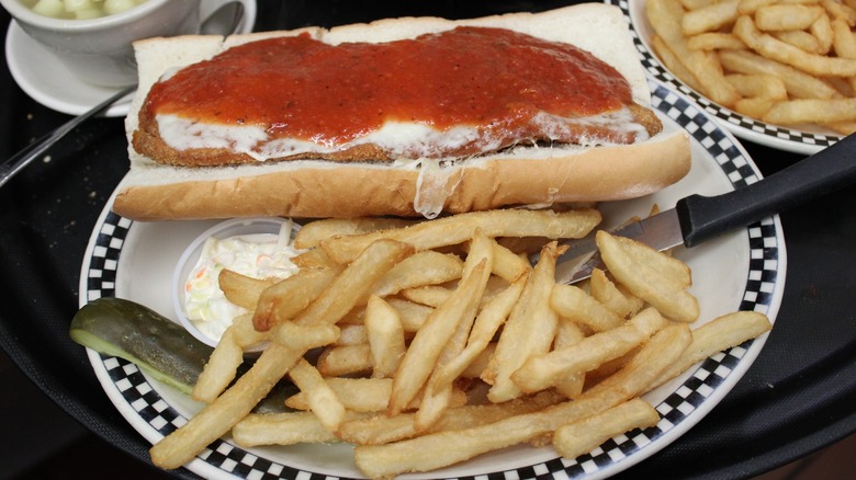 Chicken parm sandwich with fries