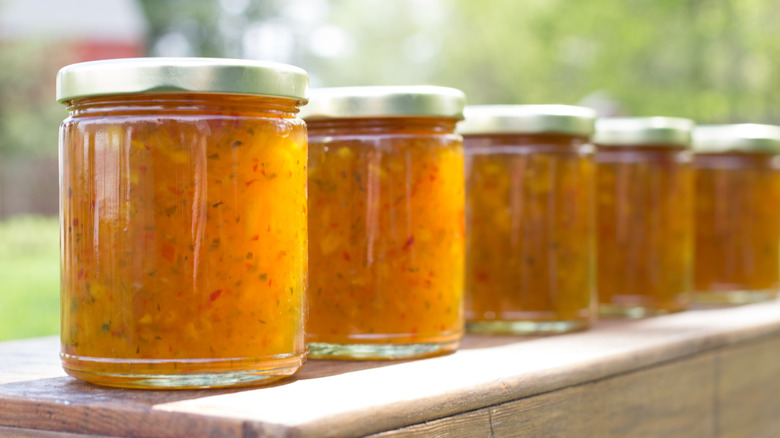 Row of pepper jelly jars