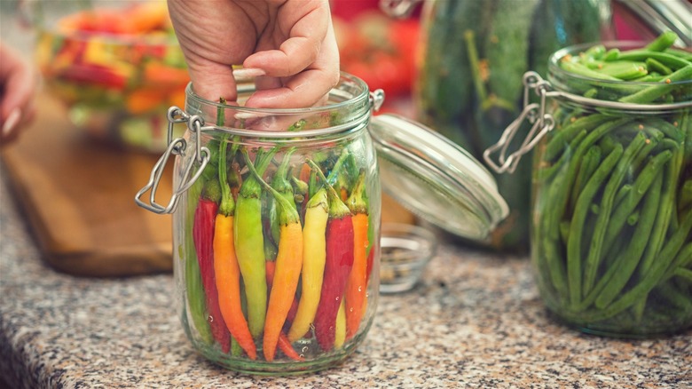chili peppers in a jar