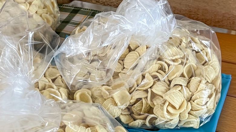 Bags of pasta on table