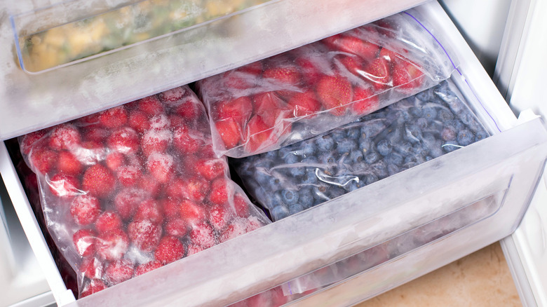 Frozen fruit bags in freezer