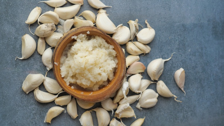 Garlic cloves minced in bowl