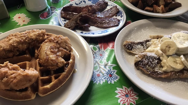 Brunch plates on green tablecloth