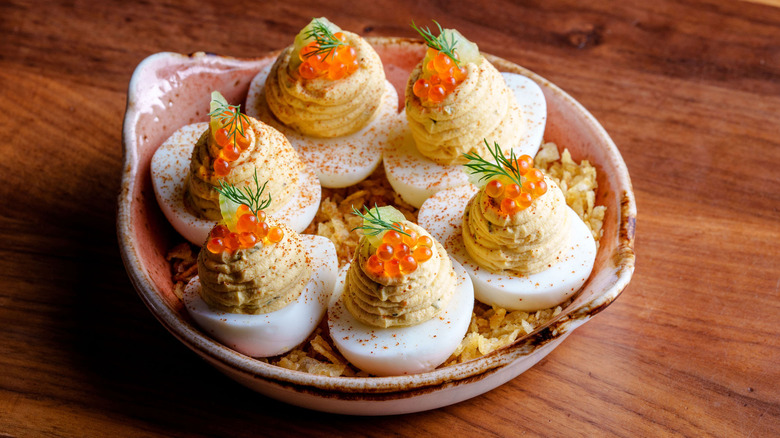 Caviar-topped creamy deviled eggs