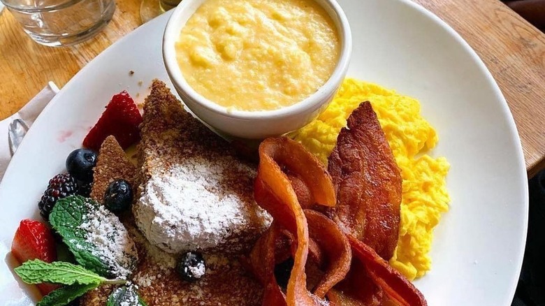 eggs, meat, grits, and toast