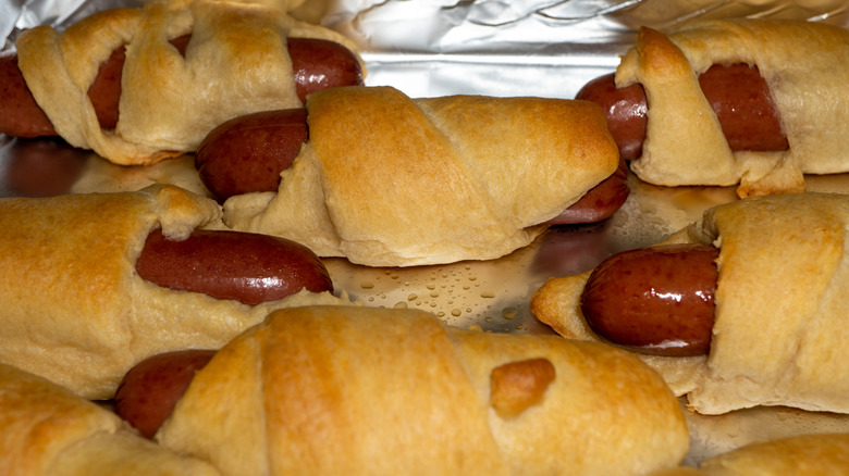 Hot dogs in crescent rolls