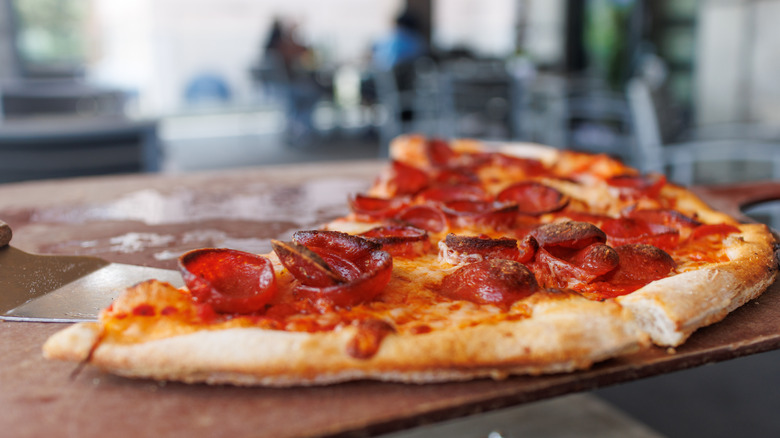 Pizza on wood surface