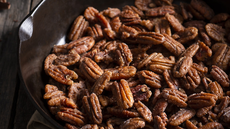 candied pecans in skillet