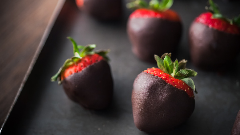 chocolate covered strawberries on tray