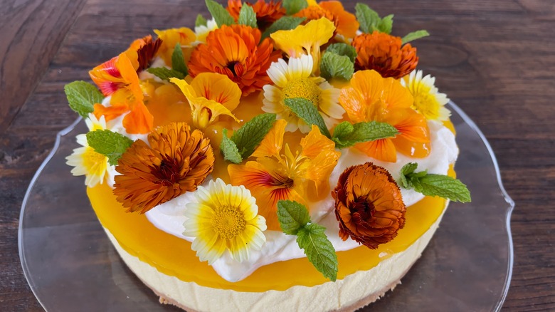 herbs and edible flowers on cheesecake