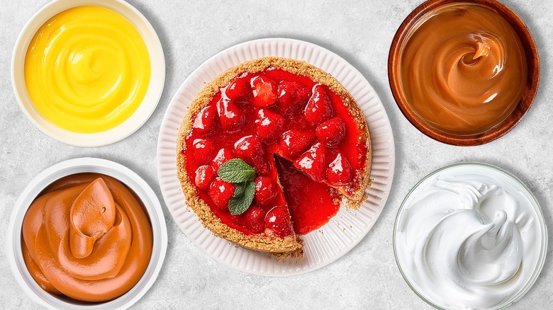 cheesecake with toppings in bowls