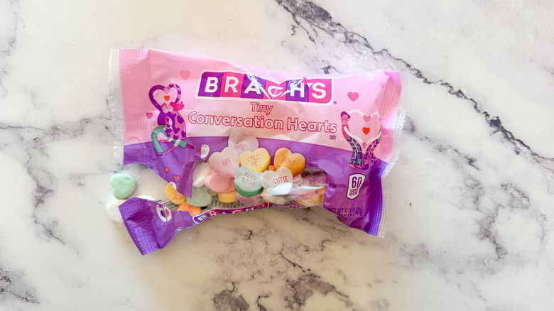 Brach's candy hearts on marble surface