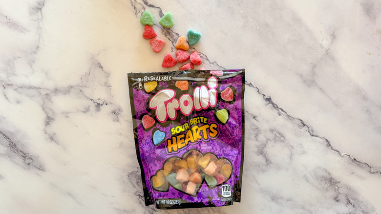 Trolli Sour Brite Hearts on marble surface