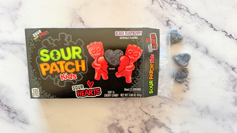 Sour Patch Kids sour hearts on marble background