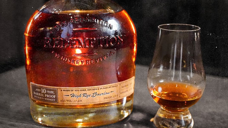 Redemption bourbon bottle and glass