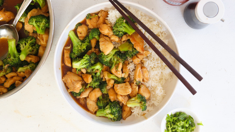 chicken and broccoli with rice in a bowl