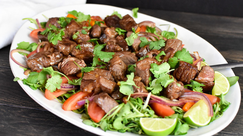 beef and herbs on platter