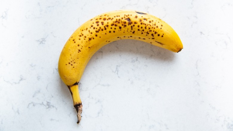 ripe banana on marble counter