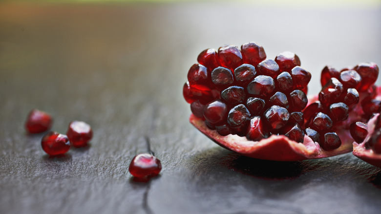 Open pomegranate and seeds