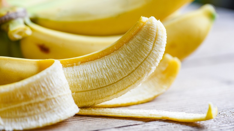 half-peeled banana
