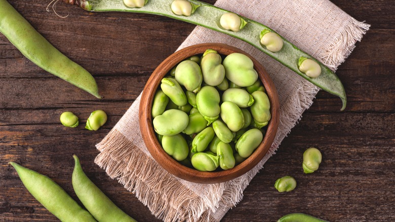 fresh fava beans on table