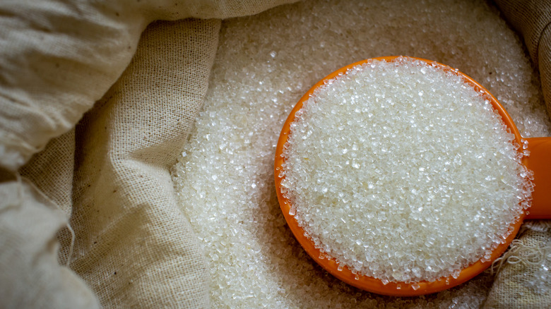 Granulated sugar with spoon