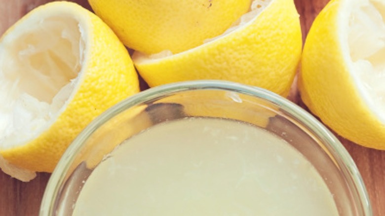 Fresh lemon juice and lemons