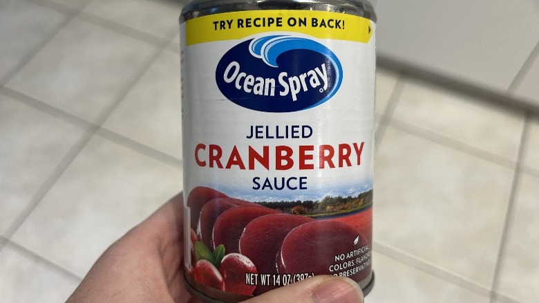 Holding canned cranberry sauce