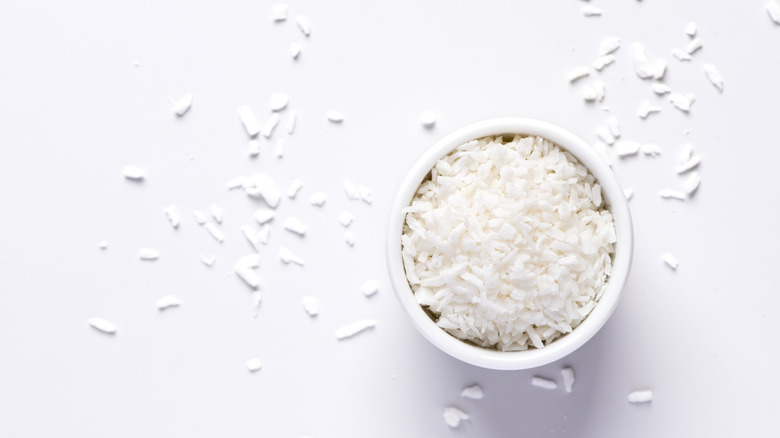 Shredded coconut in white bowl