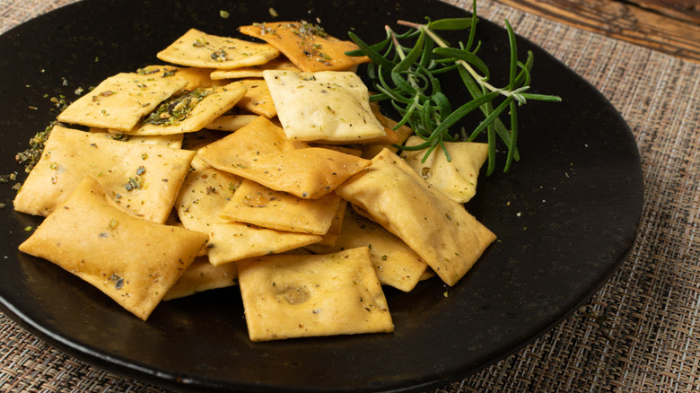 Seasoned pita chips on plate