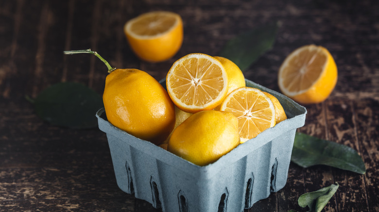 Meyer lemons in carton