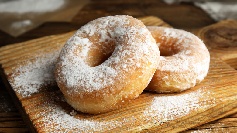 Powdered doughnuts wood board