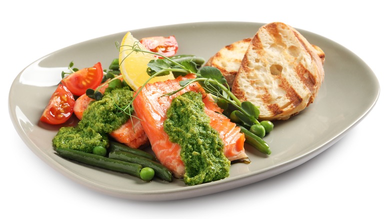 Salmon with pesto and salad