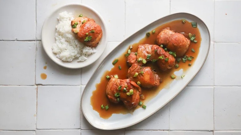 Overview of adobo chicken on plates