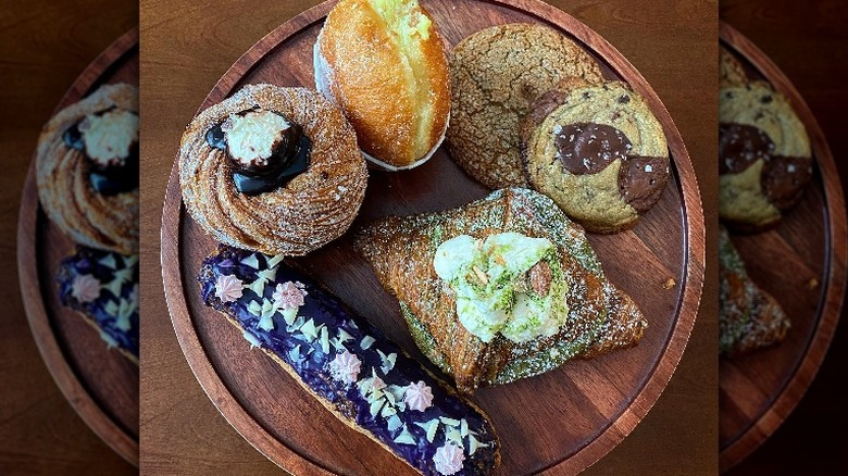 assorted pastries on wood plate