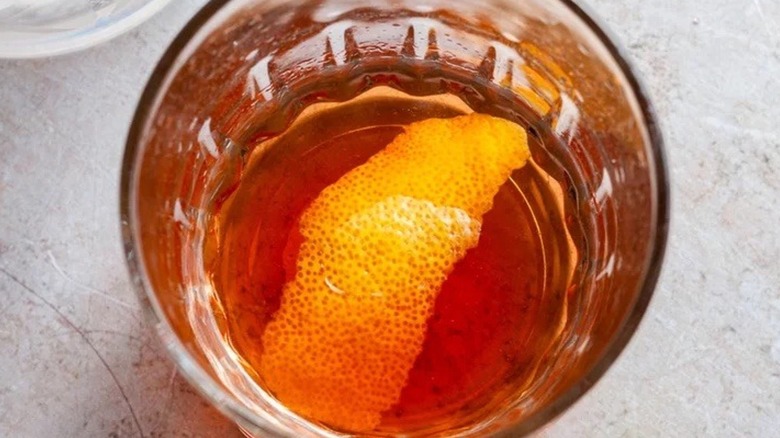 Overview of Sazerac cocktail with lemon garnish 