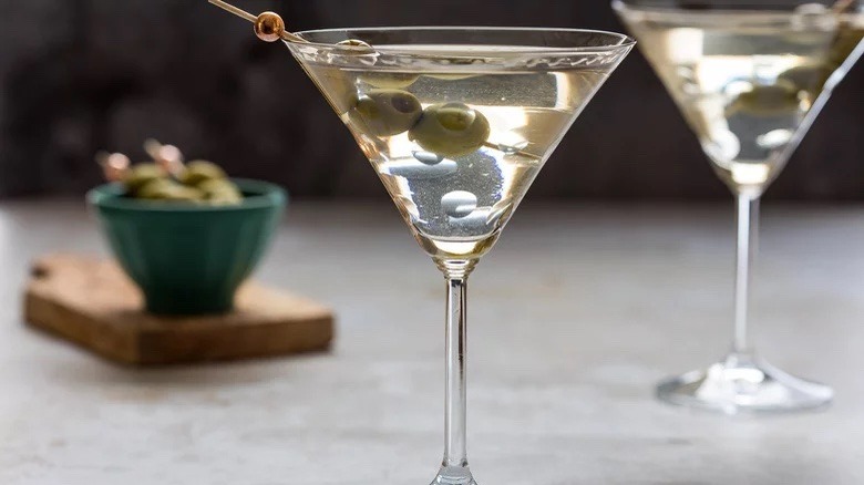 Two Martini cocktails with olives 