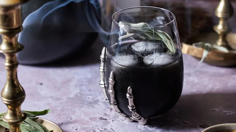 Black Corpse Reviver cocktail in a spooky glass 