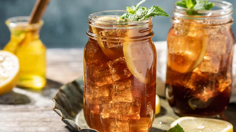 A Long Island iced tea in a glass jar