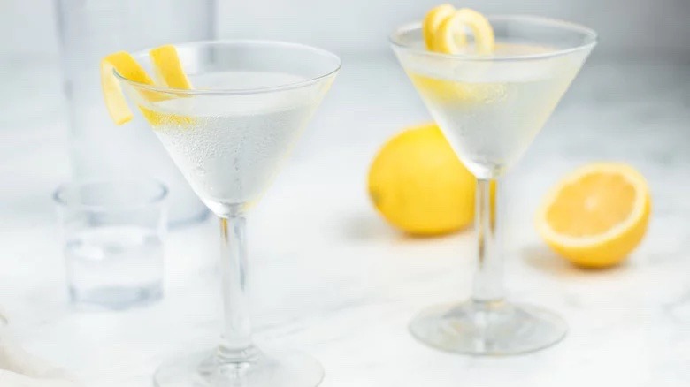 Two vodka Martinis with lemon twists