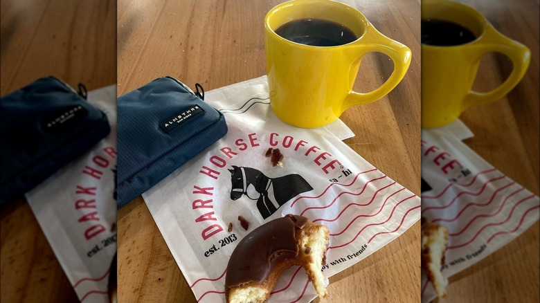 Coffee and donut on table