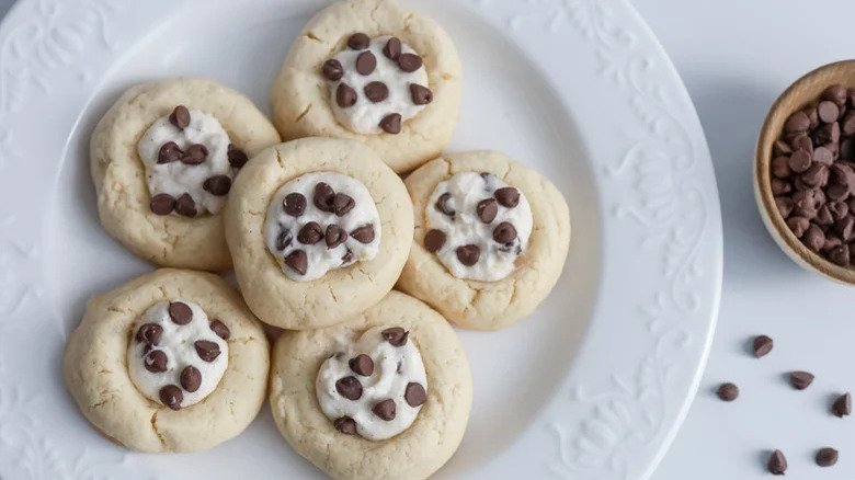 Cannoli thumbprint cookies on plate