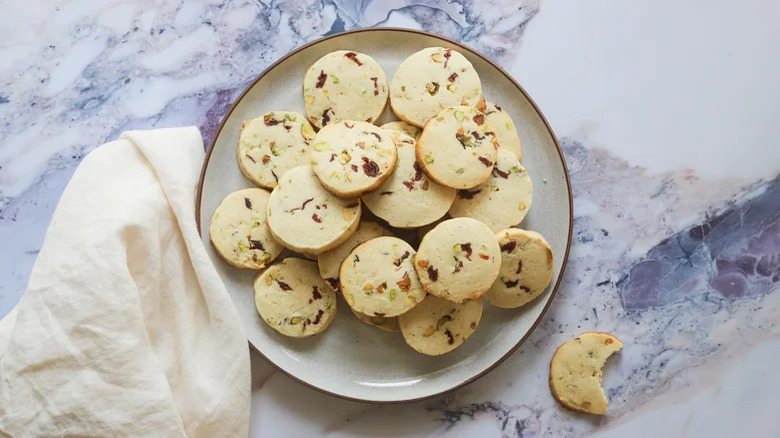 Cranberry pistachio cookies on plate