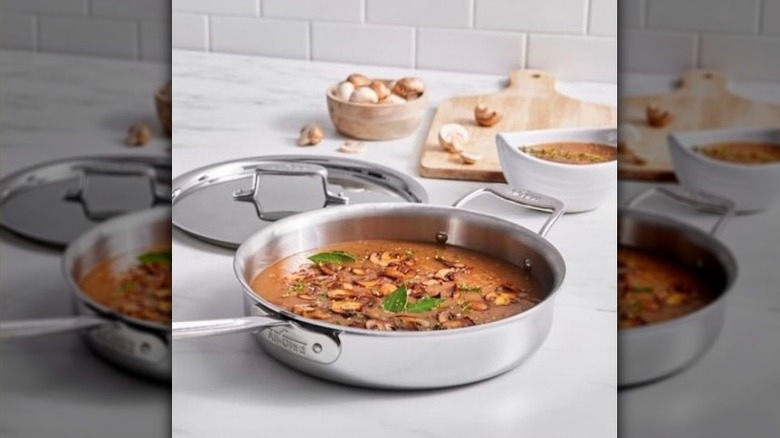 Mushroom soup simmering in All-Clad pot