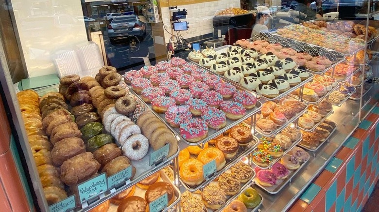 Trays of fresh doughnuts